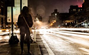 Woman walking alone at night